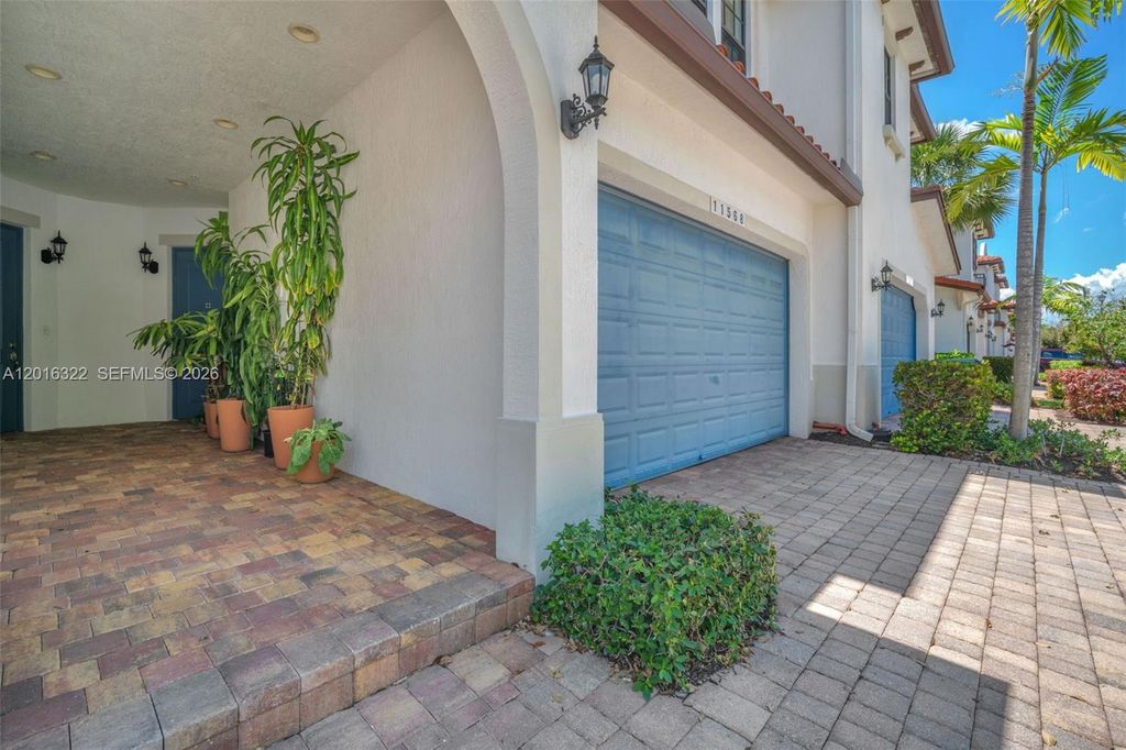 Photo of 11568 SW 13th Ln, Pembroke Pines, FL 33025 (MLS # A12016322)