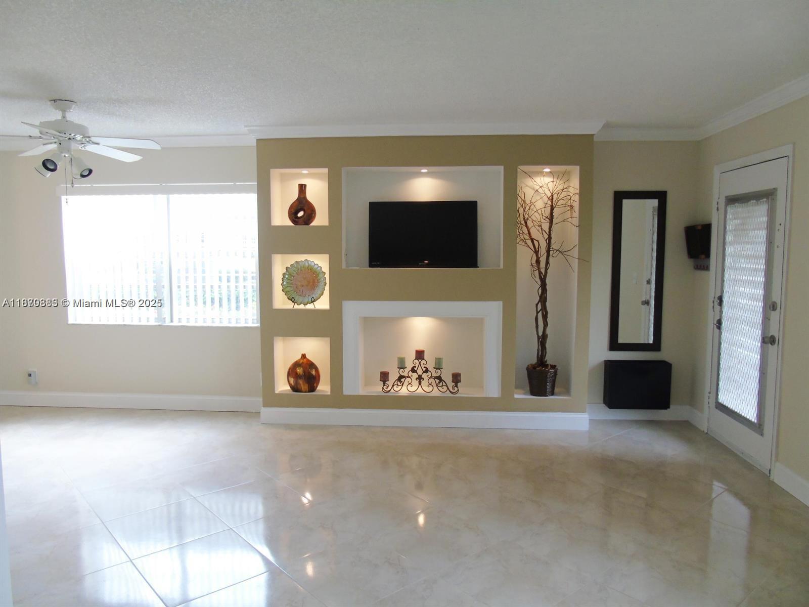 Cute 1 bedroom, 1.5 bath on the ground floor in a great 55+ community. Beautiful newer kitchen with raised ceiling. Patio was enclosed and turned into an office which includes a full size washer and dryer. Tile floor throughout and built in shelving and entertainment center. A must see. This is an active adult community features large clubhouse, pool, golf, tennis, library and theater and much more. Call today, don't miss out.!