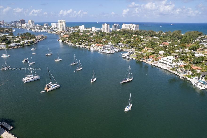 EXQUISITE, LIKE NEW MEDITERRANEAN MANSION BY THE SEA WITH 100' DOCK ON WIDE DEEP WATER.