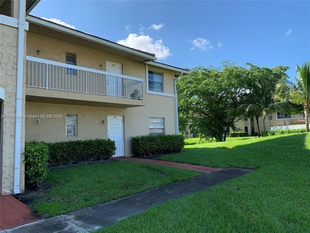Photo of 10176 Twin Lakes Dr #13-C, Coral Springs, FL 33071 (MLS # A11657699)
