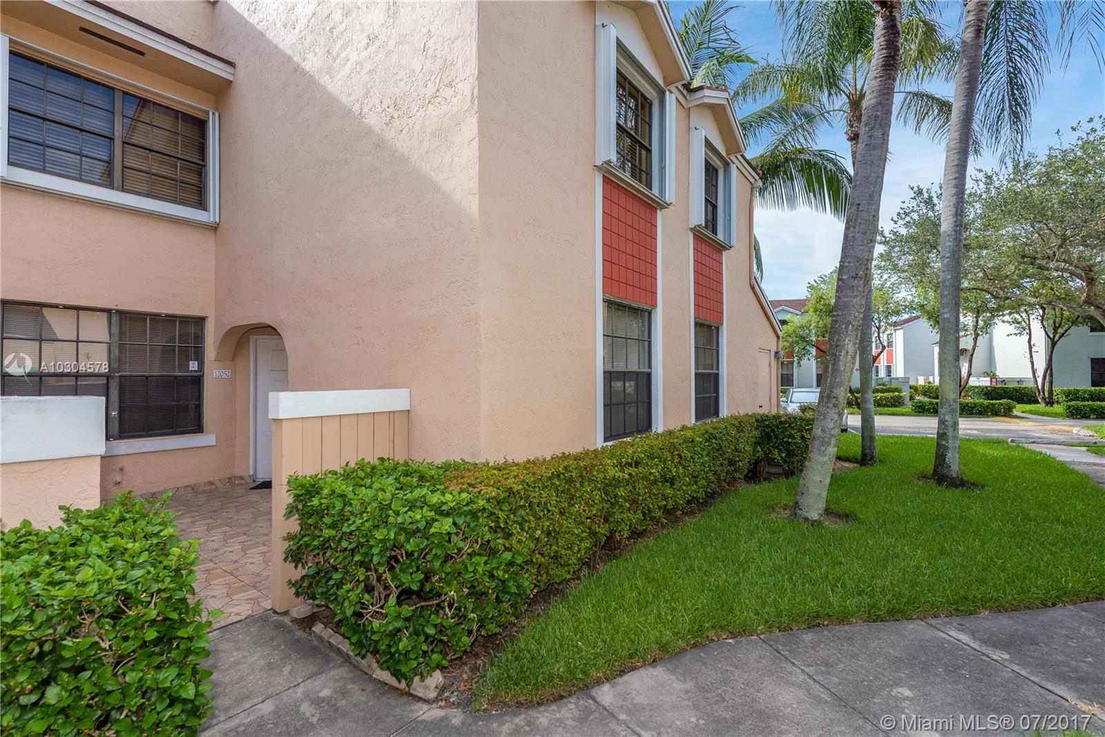 Live close to everything in Pembroke Pines! Walk into this completely renovated three bedroom, two bathroom condo and fall in love! Condo offers a private courtyard entrance. The kitchen was designed for optimal space with white cabinets, granite counters, and built-in desk area. Master suite offers porcelain wood tiles, a large closet, and updated bathroom. Spacious screened in patio also houses washer and dryer closet. The two secondary bedrooms have laminate flooring and ample space. This unit offers a large walk-in closet for storage. The pool is right around the corner!