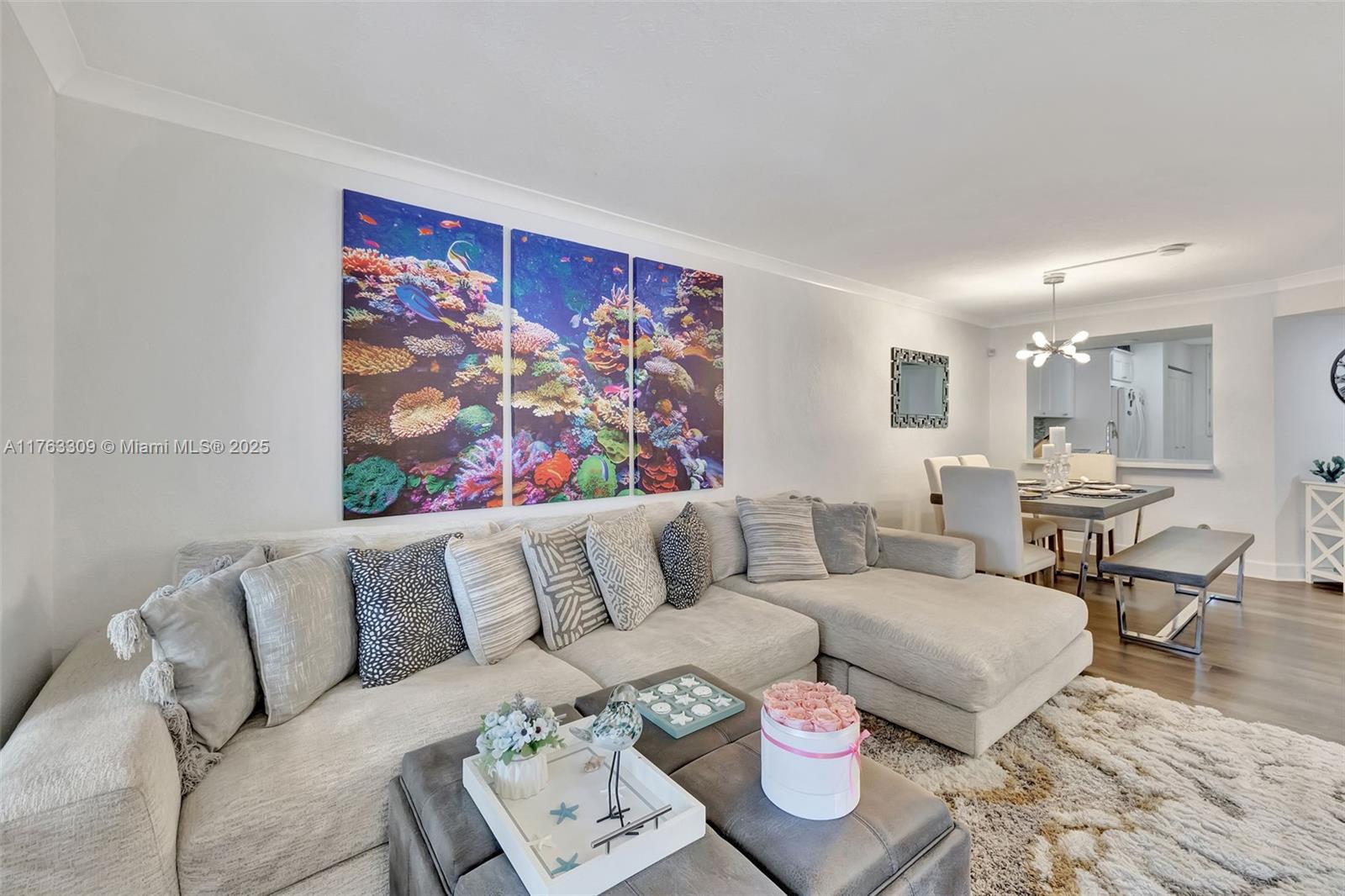 Spacious 2/2 with breathtaking views! Shows like a model unit, impeccable and pristine conditions, newer floors, newer kitchen and bathrooms, laundry in unit! Close to everything!