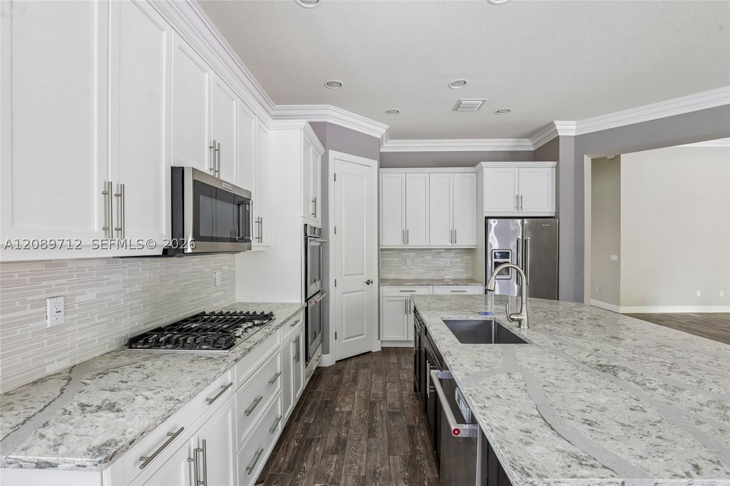 Photo of 7990 NW 112th Ter, Parkland, FL 33076 (MLS # A12089712)
