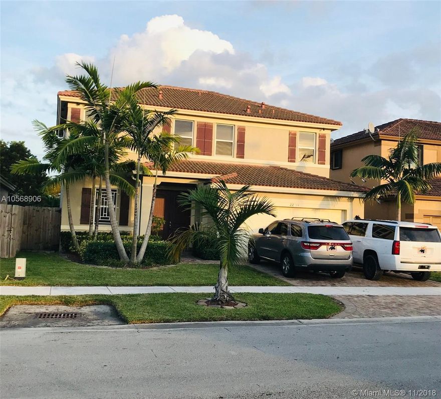 Beautiful new 4 bedroom, 2.5 bathroom, 2 car-garage home built in 2015 located in a great community. Tile and wood flooring, granite counter-tops and stainless steel appliances.  NO HOA, NO CDD!! 6-12th grade academy & new park located right across the street.  Conveniently located close to major highways and shopping centers. Roof, A/C and appliances still under warranty. Covered patio area with stamped concrete, gated windows and security cameras installed. Lots of parking space, Laundry room upstairs, and bonus room downstairs.  Dual sinks, his and hers walk-in closets and more.  This is a must see!