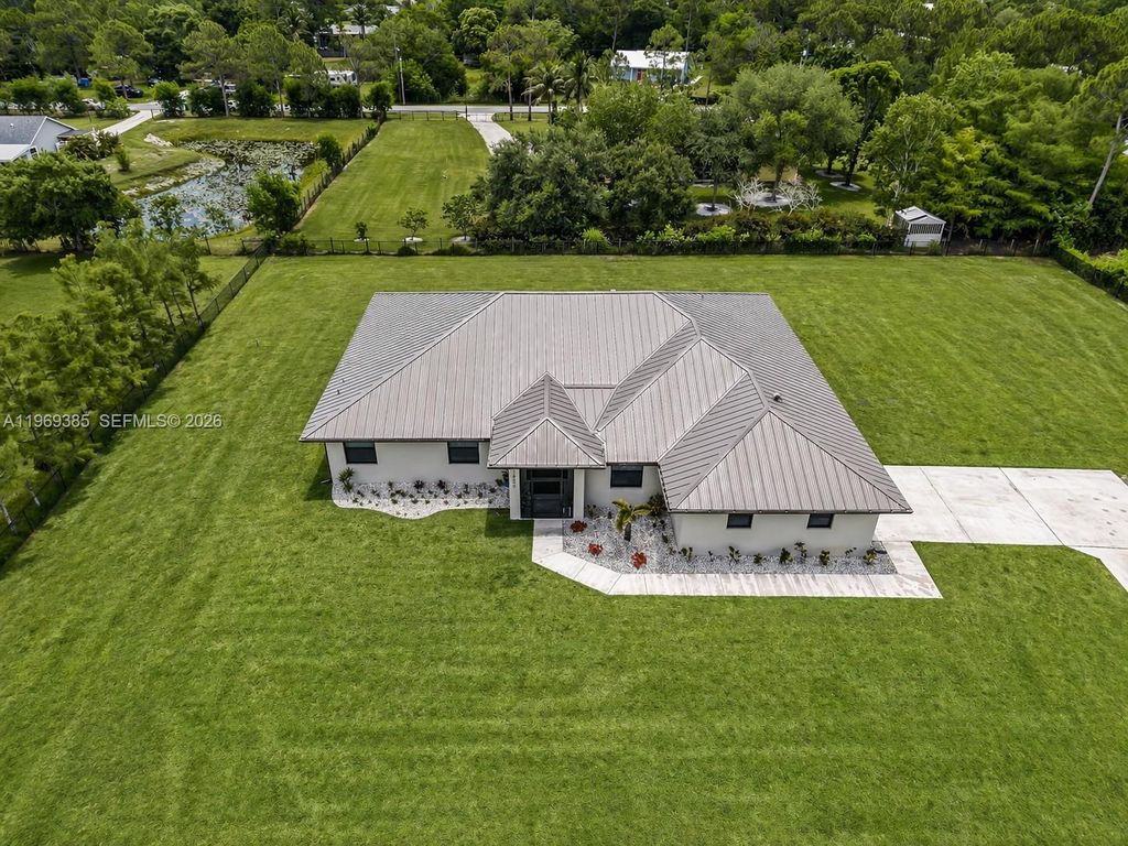 Photo of 16630 N 132nd Ter N, Jupiter, FL 33478 (MLS # A11969385)