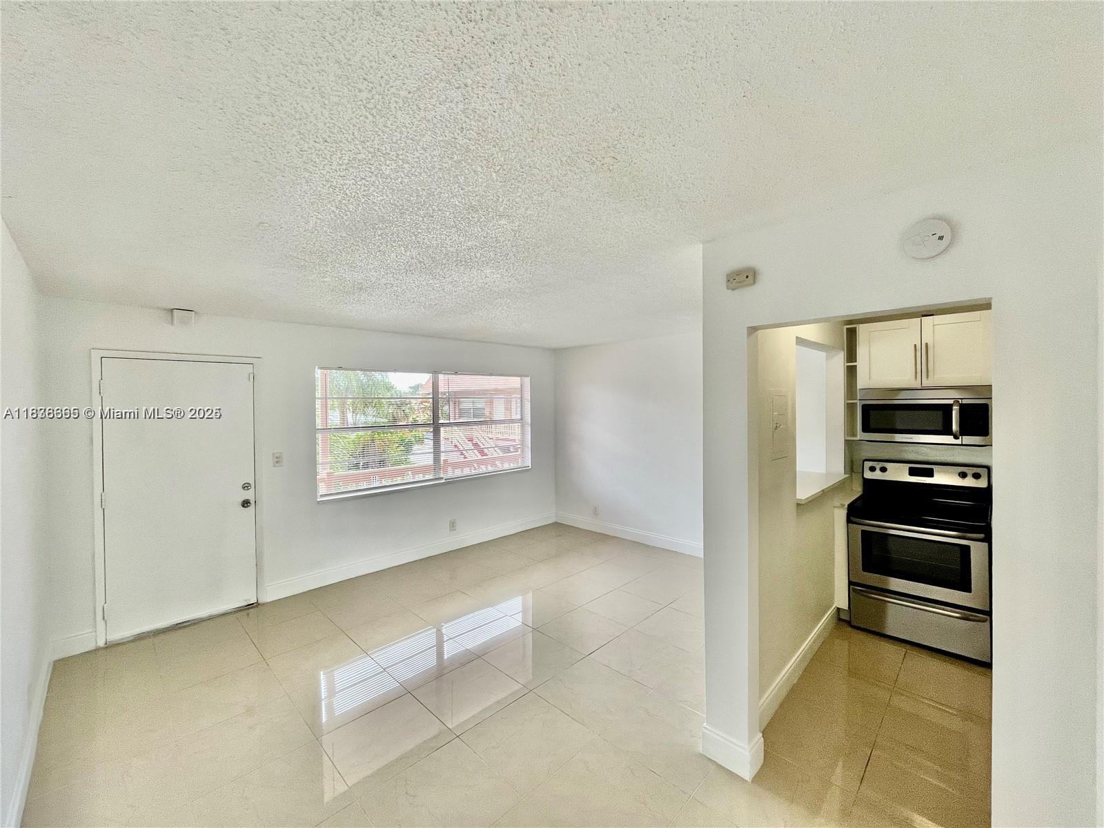 Cozy and inviting one-bedroom apartment, fully tiled throughout. Features a renovated kitchen and bathroom, onsite laundry, an assigned parking spot, and access to a community pool. You’re sure to fall in love with this unit.