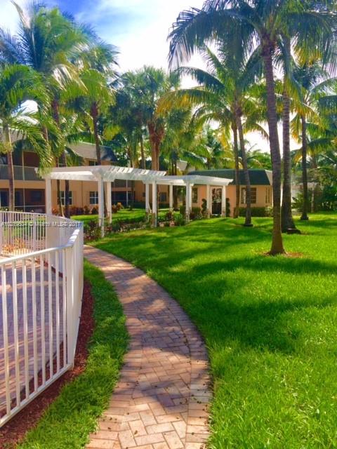 BEAUTIFUL AND SPACIOUS CORNER UNIT, RENOVATED, GRANITE KITCHEN COUNTER TOP, OPEN AND BRIGHT, LAUNDRY INSIDE, ALL TILED FLOOR, RARE TO FIND. CLOSE TO THE BEACH. CONDOMINIUM INCLUDES 2 POOLS, GYM AND A BEAUTIFUL GARDEN. EASY TO SHOW. seller requires Buyer use seller's title company TITLE & ESCROW NETWORK