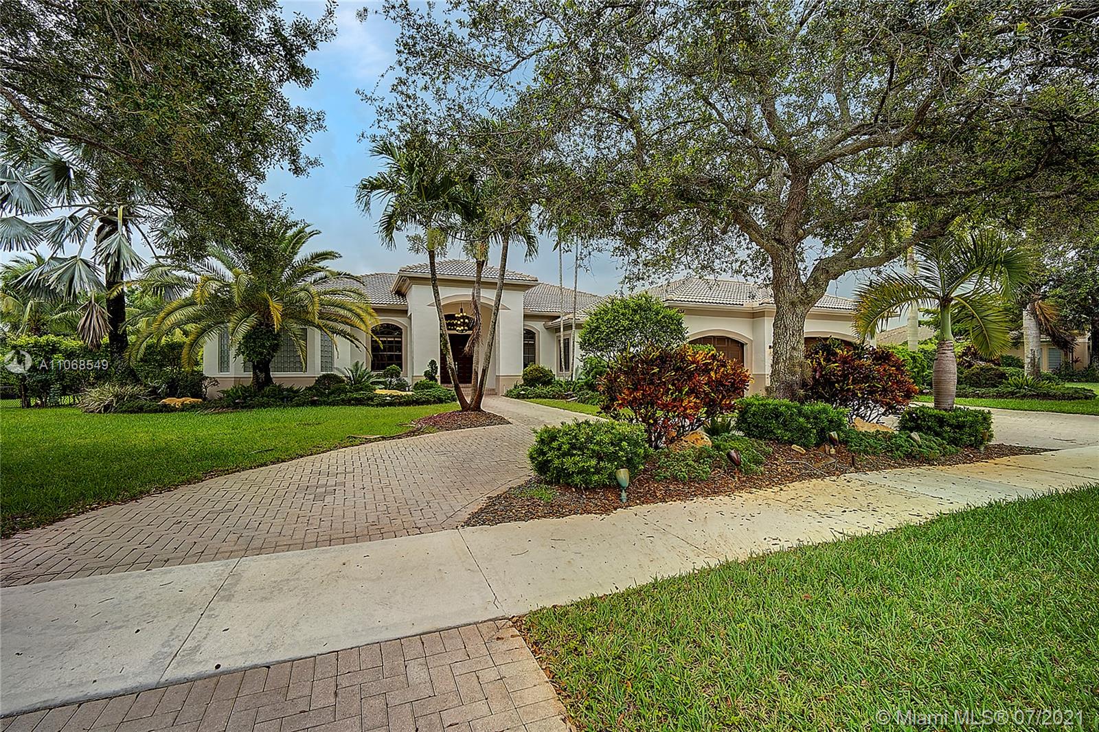 Spectacular Imagination Farms estate now available. Absolutely no expense was spared in this completely renovated Gramercy model that features an open floor plan concept which includes 5 bedrooms, 4 bathrooms, 3 car garage, an enormous family room, living room, formal dining room, large foyer, gorgeous marble flooring through-out living areas, crown molding, an absolutely beautiful custom pool with waterfall and on an expansive lot with huge circular driveway. The Luxury master suite includes a huge walk-in closet with custom built cabinetry, a bathroom built for royalty with dual sinks, shower & an absolutely stunning mosaic masterpiece just above your very own whirlpool tub. Other features include accordion shutters throughout & much more.