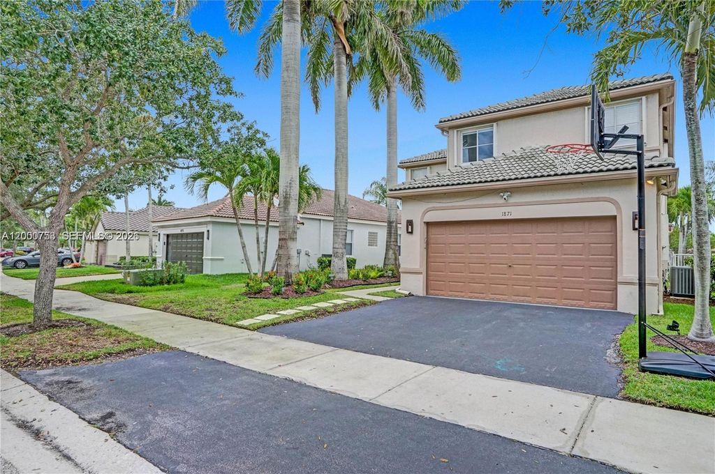 Photo of 1871 Silverbell Ter, Weston, FL 33327 (MLS # A12000753)