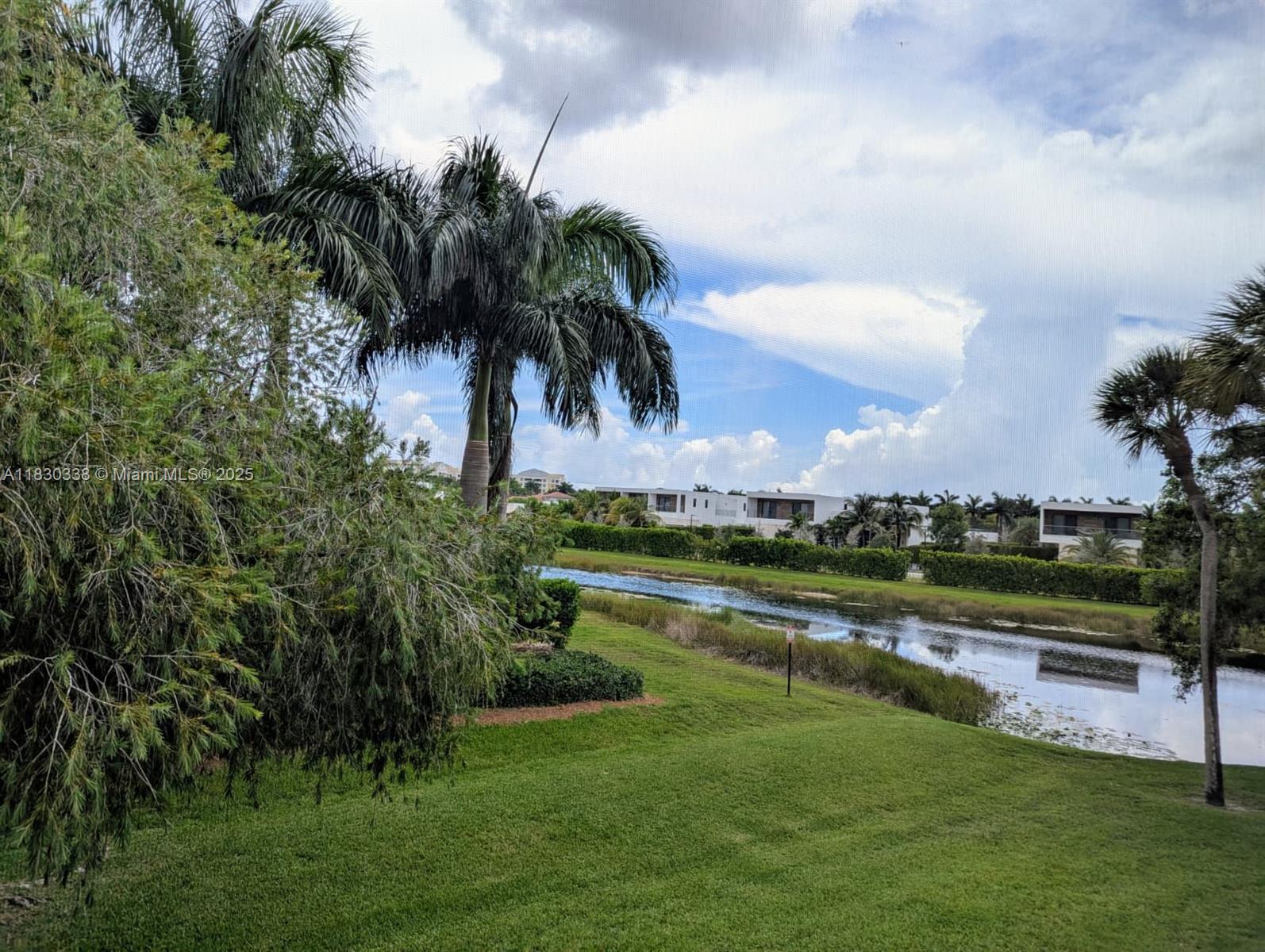 INVESTORS! Beautifully updated apartment, Freshly painted, the home features brand-new laminate flooring elegant bathrooms. 2 spacious bedrooms and 2 bathrooms, big closets, this home is designed for both comfort and style. Big screen balcony provides additional living space. Serene view to the garden and indirect lake, creating a stunning for relaxation. Offer a storage and 1 parking, while the Bonaventure clubhouse boasts a large gym and a variety of top-tier amenities. The best schools in the area. The association fee included: Water service, waste, maintenance of common areas, roof care, Lanscaping & Pool. Additional enjoy the Bonaventure club ($378 anual).