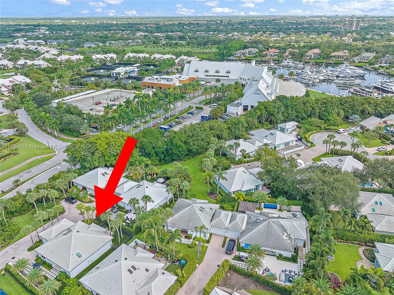 Renovated Club Cottage - Within walking distance to The Club, Tennis, Pickleball, Marina & Spa. Open kitchen to family, awning over patio, synthetic turf, updated Primary bath and new floors throughout. This unit is move in ready!