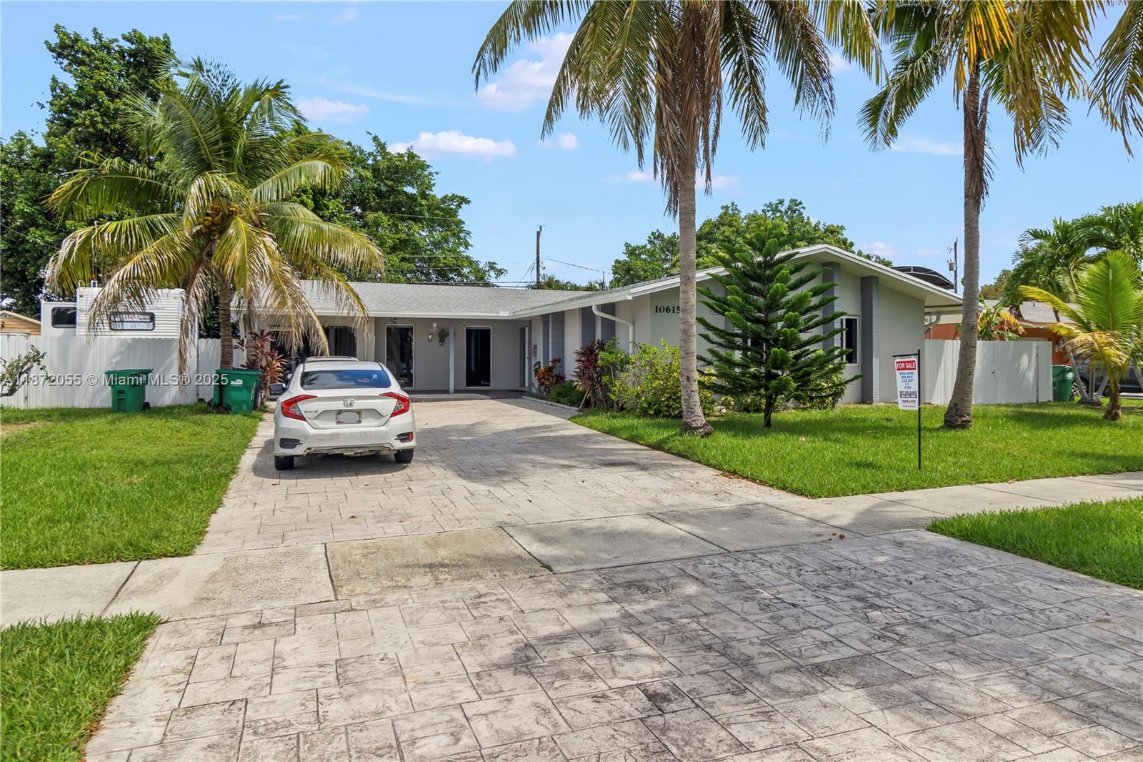 Beautiful Cutler Bay residence with pool and jacuzzi on an oversized lot! This spacious 4-bedroom, 2-bath home features an open kitchen with dining island, bright living room, and a split floor plan for privacy. The property also includes a separate studio apartment with private entrance and bath, perfect for in-laws, guests, or rental income. Enjoy South Florida living at its best with a huge covered patio, sparkling pool, and relaxing jacuzzi ideal for entertaining. Additional highlights include a large laundry room, ample parking, and a welcoming front porch. Conveniently located near Southland Mall, parks, schools, and major highways. A true Cutler Bay gem with great versatility for families or investors.