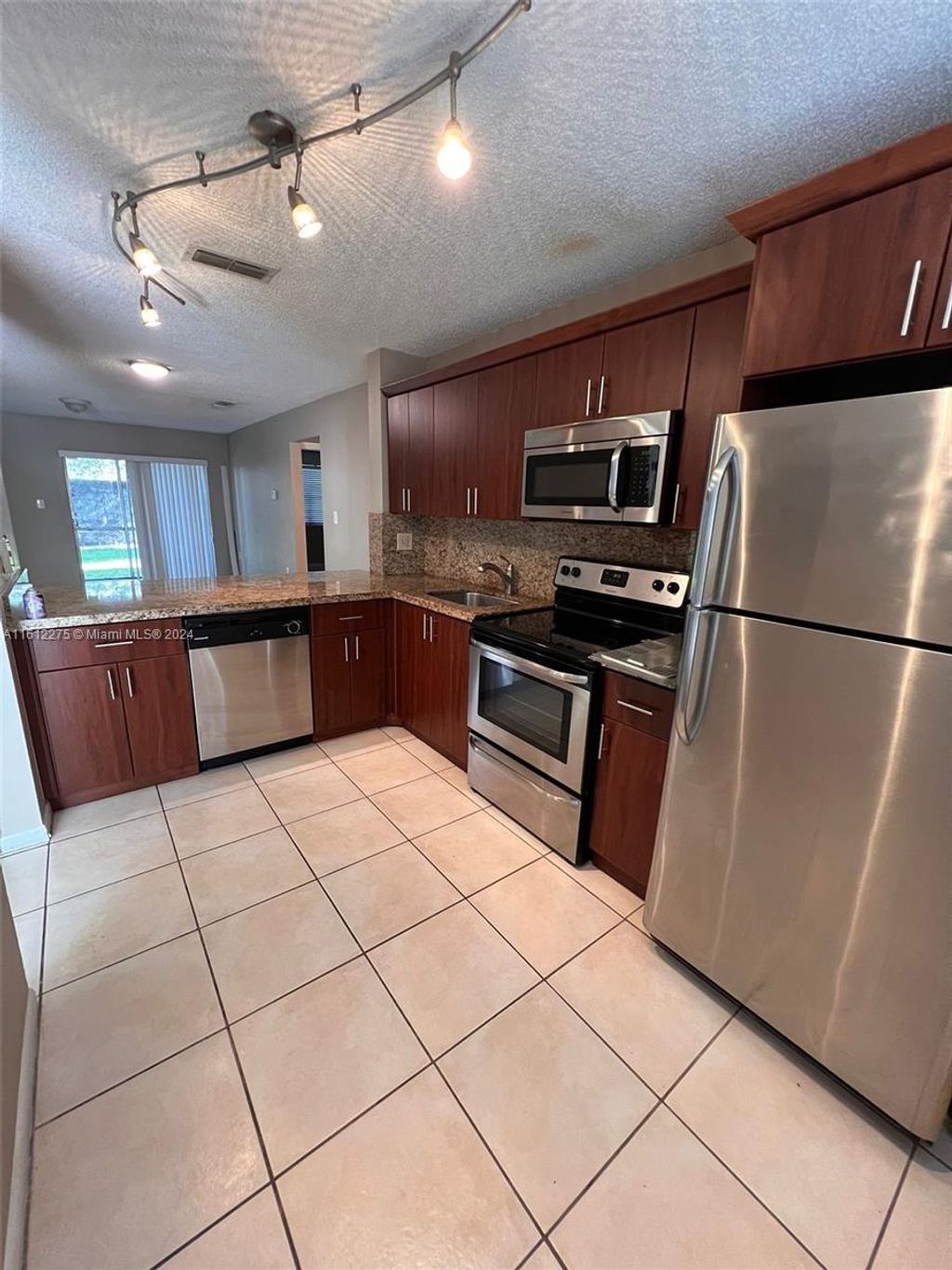 Photo of 8049 SW 21st Ct #106, Miramar, FL 33025 (MLS # A11612275)