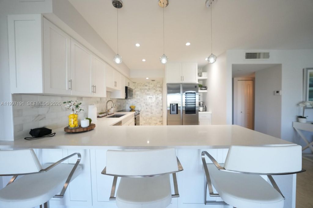 Photo of 200 Diplomat Pkwy #827, Hallandale Beach, FL 33009 (MLS # A11997191)