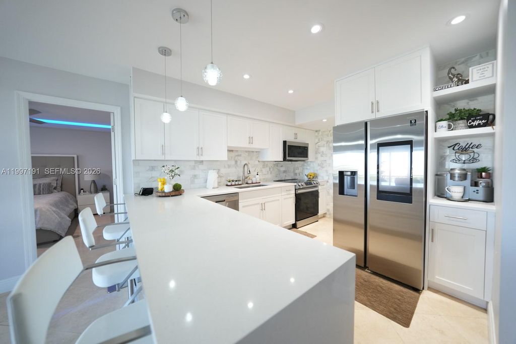Photo of 200 Diplomat Pkwy #827, Hallandale Beach, FL 33009 (MLS # A11997191)