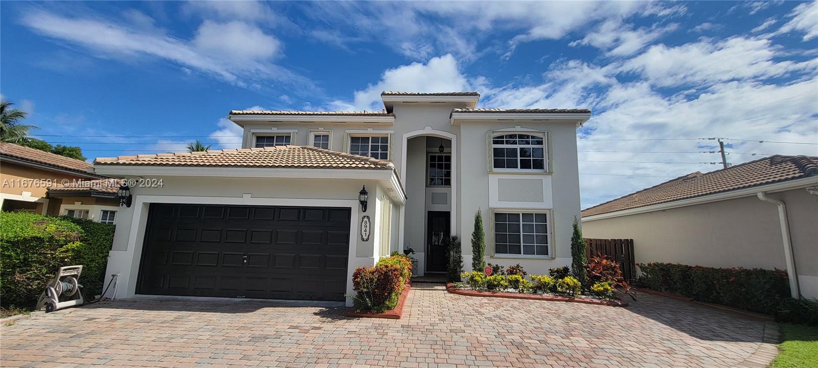 Welcome to this stunning two-story UNFURNISHED home in the highly sought-after community of Pelican Bay at Old Cutler Lakes. This beautifully designed residence offers 4 bedrooms, 3 bathrooms and spacious living and family rooms, providing ample room for everyone. The first floor features an impressive gourmet kitchen with 42" cabinets, granite countertops, stylish backsplash, stainless steel Whirlpool appliances, with a brightly lite breakfast nook. 1 bedroom & full bath downstairs currently used as a guest room, formal dining area, laundry room, 2 car garage with Tesla compatible outlet, marble floors downstairs and laminate floors upstairs, recessed lighting, lots of natural light, spacious backyard and paved patio perfect for entertaining.