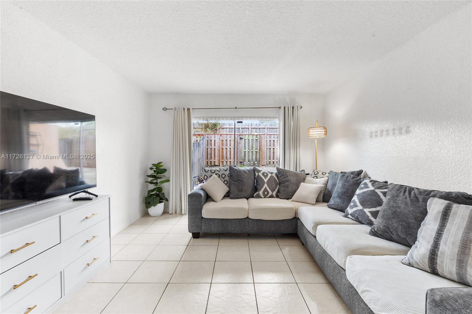 Welcome to the wonderful community of PUERTA DEL SOL. This well-managed condominium is an excellent property to consider as you can buy with as little as 5% down. The association has reserves. This spacious 2/2 is a must see with plenty of closet space as well as your own private backyard. It is a great starter home. Located off of Kendall Drive and 99th Avenue, the location is IDEAL! You are close to the Palmetto, the turnpike, shopping malls , great schools and so much more! This property really has everything you want for the price and more! Schedule a showing now so that you can see for yourself what a great unit this is. Don't miss out!!