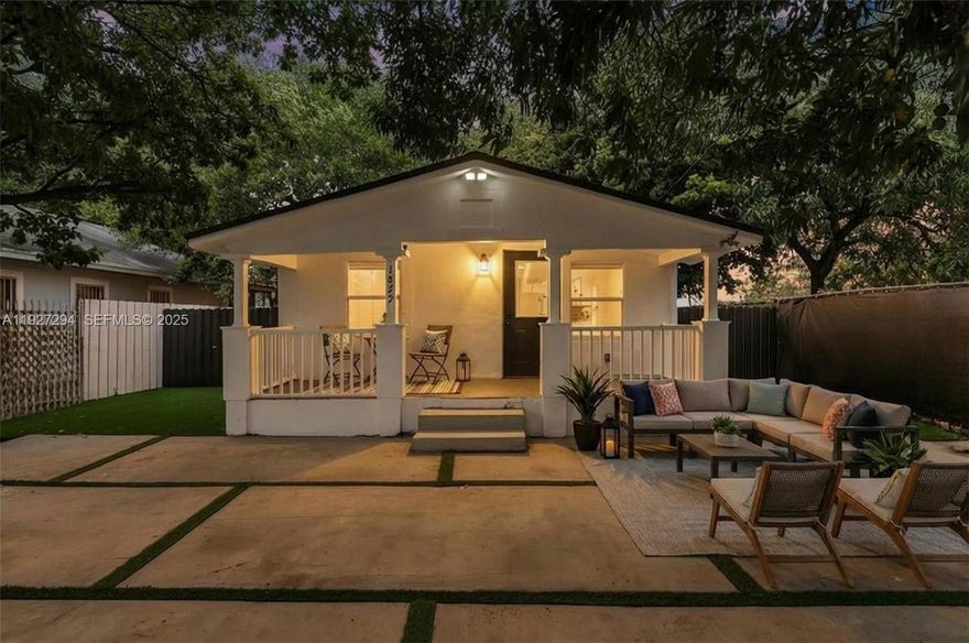 Beautifully updated and redesigned 3-bedroom, 2-bathroom single-family home, move-in ready and featuring a full modern renovation. The property offers a new kitchen with quartz island and countertops, stainless steel appliances, new vinyl flooring throughout, fully remodeled bathrooms, new impact windows, and upgraded interior finishes. The exterior includes an updated driveway enclosed with a modern fence and a comfortable covered backyard area ideal for gatherings and outdoor dining. The home is located in an excellent area, just steps from the corner, offering convenience and accessibility. The home’s layout also offers a flexible design with potential for creating an efficiency.

Please note: Interior living area is larger than tax records (approximately 970 sq. ft.); buyer to verify all measurements.