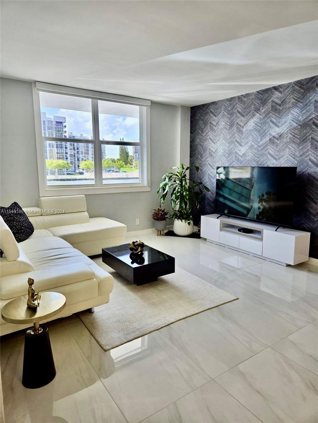 Photo of 3000 S Ocean Dr #108, Hollywood, FL 33019 (MLS # A11549196)