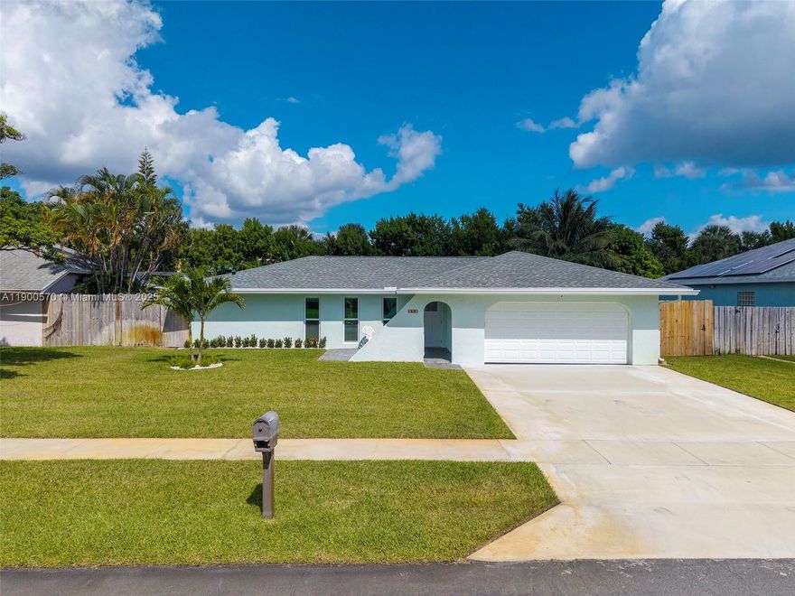 Located in the highly sought-after Yachtmans Cove subdivision—a true "secret gem" for boaters—this well maintained 3-bed, 2-bath home is a must-see. Step outside to your large backyard featuring a beautiful kidney-shaped pool. Boaters will rejoice at the side alley that can accommodate a boat on its trailer, w/ a boat ramp less than a mile away!  Unparalleled location close to the Intracoastal & Boynton Inlet, placing you in prime East Boynton Beach, and without HOA! Enjoy peace of mind w/ brand new impact windows throughout, and a recent roof (2023). The new oversized driveway (2023) was reinforced w/ 6 inches of concrete, adding to the home's durability.  Enjoy the beach a short drive away & the vibrant dining & entertainment hot spots nearby.