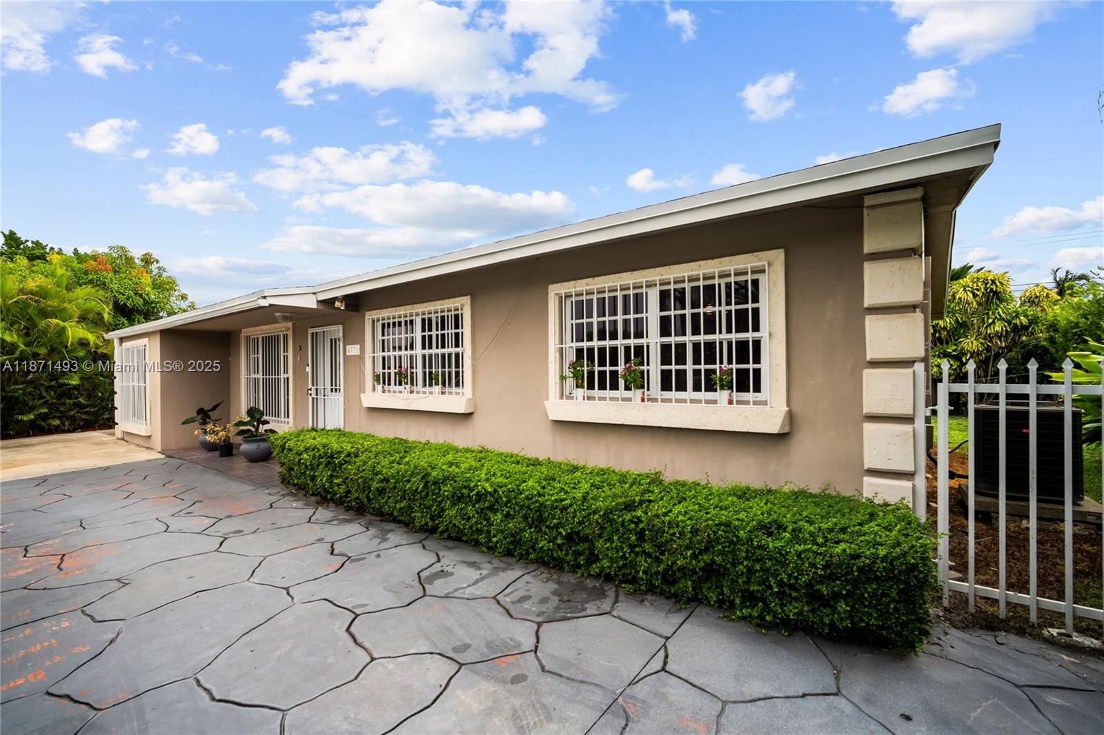 Move-in ready gem in the heart of Olympia Heights! This 3/1 home offers a versatile legal 1/1 studio in the back—perfect for in-law quarters or rental income. Surrounded by lush tropical landscaping, the property blends privacy with charm and curb appeal. Inside, you’ll find a bright, welcoming layout ideal for family living or investment potential. Whether you’re looking to settle in or earn passive income, this home checks all the boxes. Centrally located near Bird Rd, Tropical Park, FIU and major highways. A-rated schools nearby and NO HOA!