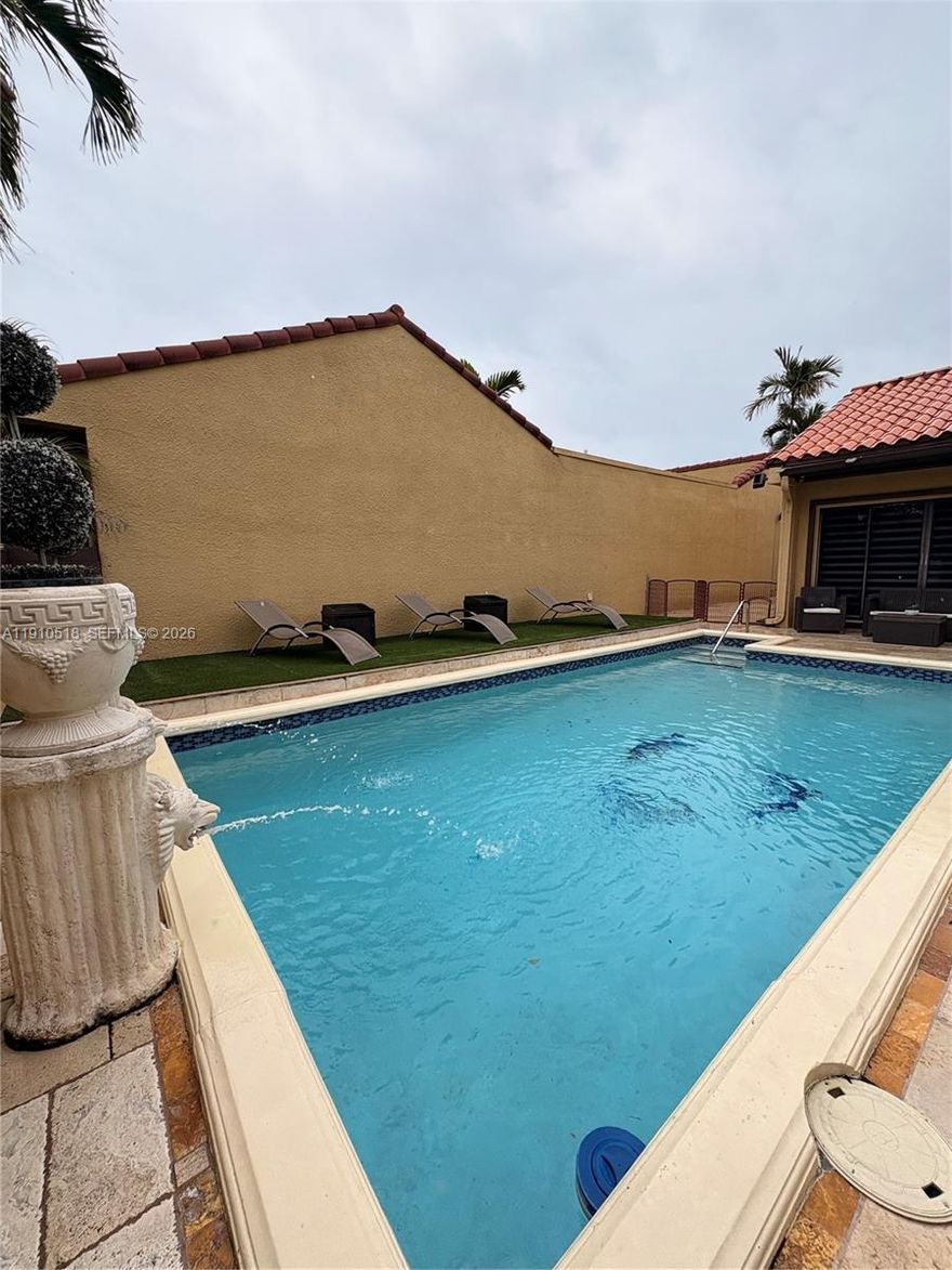 Beautiful and completely renovated 2 bed 2 bath home. Gated community 24/7. New A/C. Jaccuzzi and BBQ area.   Two car garage, Walk in-closet. Open concept kitchen with stainless steel appliances. Wood molding. The entire house and bathroom are made of stone tiles . Close to beaches and all major highways and airports,Aventura Mall 5 min away. Perfect for 2 home or livie with you family here !!! good scholl around the area :)