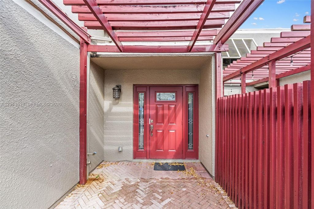 Photo of 1391 W Fairway Rd, Pembroke Pines, FL 33026 (MLS # A12011618)