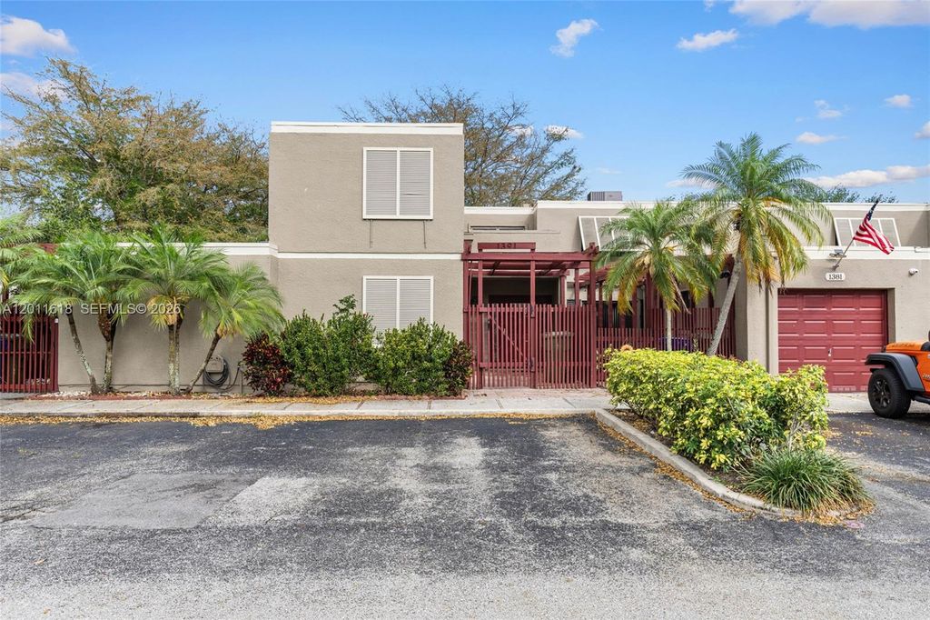 Photo of 1391 W Fairway Rd, Pembroke Pines, FL 33026 (MLS # A12011618)