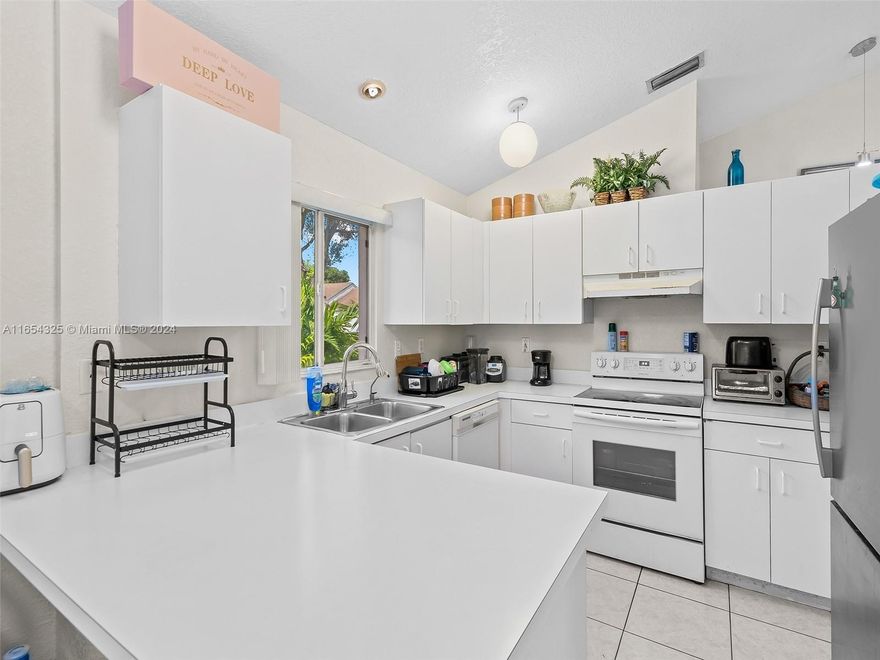 Charming 3-bedroom, 2-bathroom corner home with a spacious 2-car garage. The property features vaulted ceilings, adding to the open and airy ambiance. The roof was replaced in 2019, and both the interior and exterior were freshly repainted within the last year. Beautifully landscaped surroundings add curb appeal and provide a serene outdoor environment.