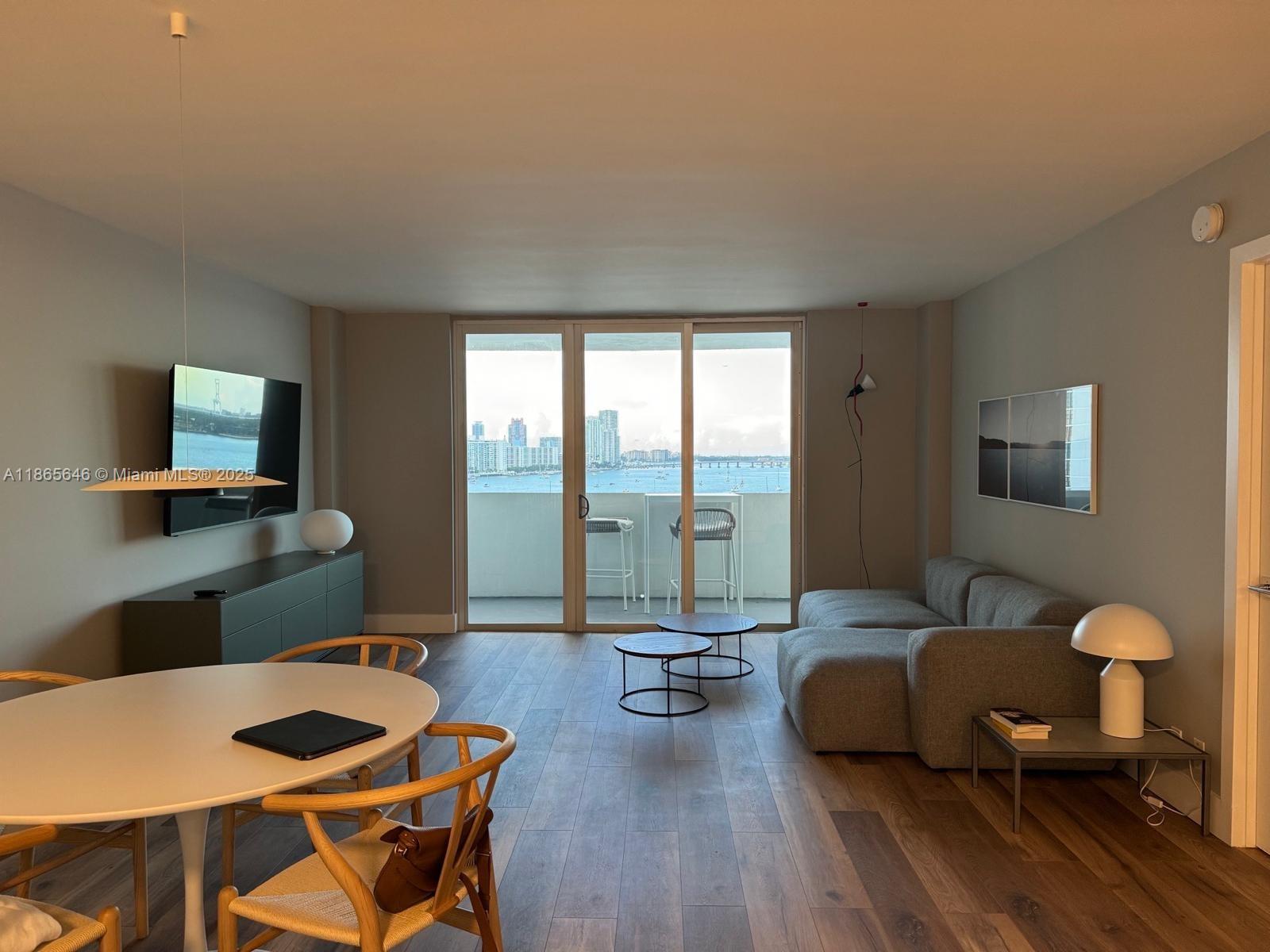 Gorgeous, modern, and fully renovated bayfront paradise! Enjoy direct views of Biscayne Bay and sunsets over the Miami skyline from your private terrace. Open kitchen with modern Quartz waterfall counters; Whirlpool/Bosch appliances; reverse osmosis water filter; oversized living room with large terrace; hurricane impact sliding doors and window; huge master suite with blackout blinds, custom walk-in closet, and stylish bathroom with dual vanities and abundant storage cabinets. Also includes large storage locker on the same floor. Walking distance to popular Sunset Harbor, Standard Hotel, Trader Joe's etc. Finely finished with European furniture and design Italian lightings. Yearly only, first, last and security. NO PETS.