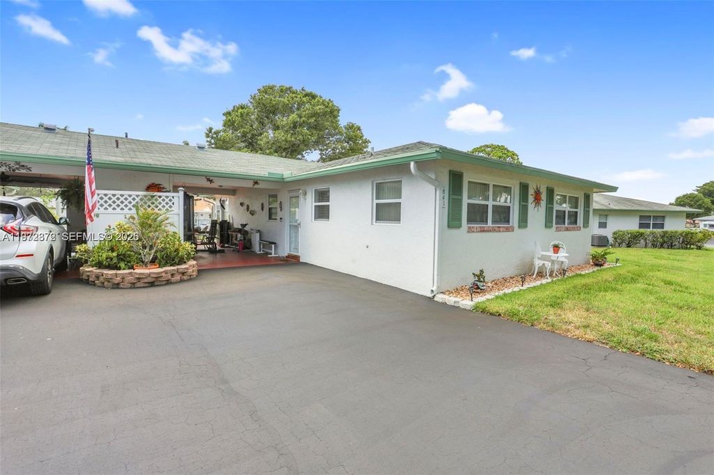 Photo of 841 Meadowlark Ln, Delray Beach, FL 33445 (MLS # A11972372)