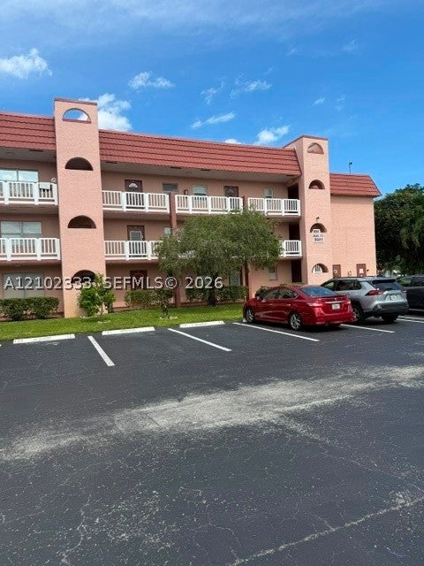 Photo of 9641 Sunrise Lakes Blvd #111, Sunrise, FL 33322 (MLS # A12102333)