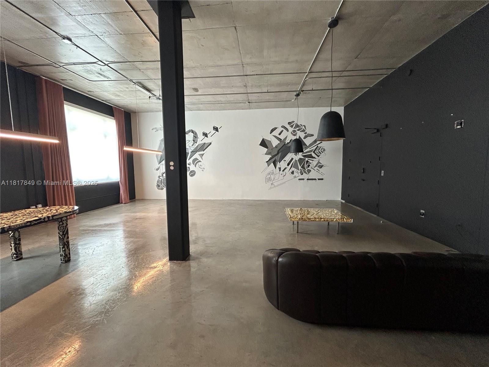 FIRST & SECURITY ONLY! Wynwood Lofts is a spacious living/work space. This loft in Miami’s vibrant Wynwood district features industrial-chic design, modern amenities, and flexible use for LIVING, WORKING, OR BOTH. The boutique building offers covered parking, a rooftop pool, and is pet-friendly. With TAX BENEFITS Potential deductions for HOME OFFICE expenses. With an enhanced work-Life balance lifestyle, There is no need to rent a separate office space. The Building Features: Exclusive Community, A secure building with wide corridors for easy access, Premium Amenities Covered parking, a dedicated loading area, no commute, and a prime location near art, dining, and shopping, it’s ideal for creatives and professionals seeking convenience and style in one space. Come see today!