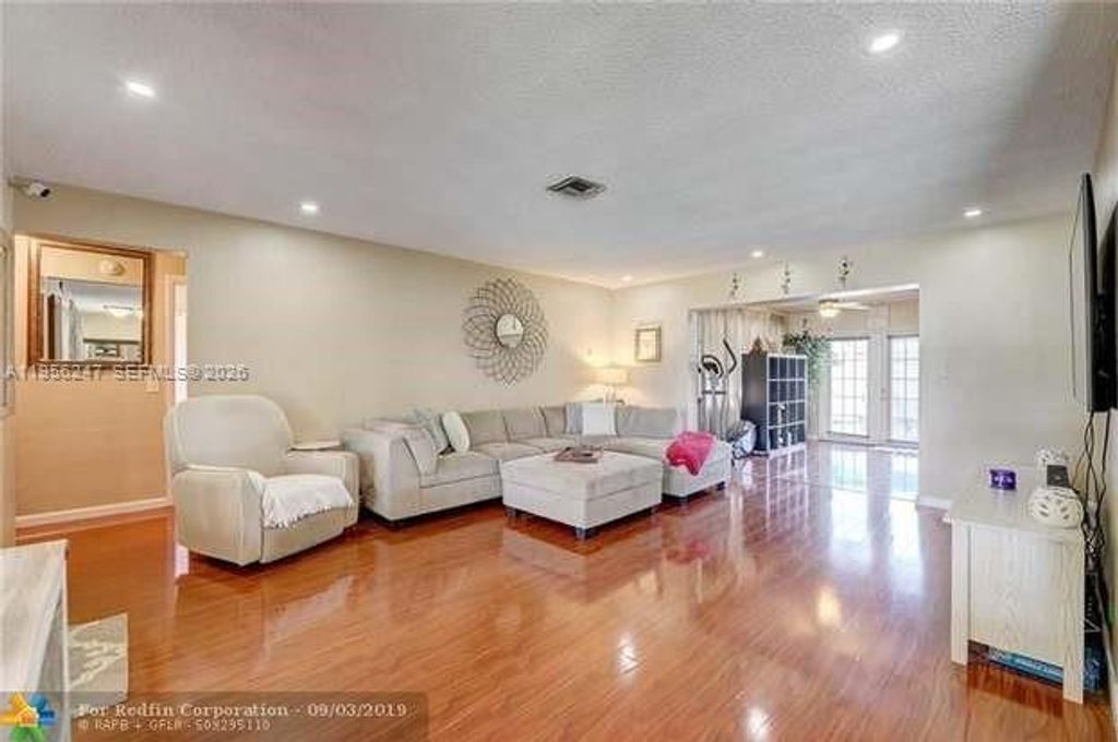 Photo of 8520 NW 10th St, Pembroke Pines, FL 33024 (MLS # A11956247)