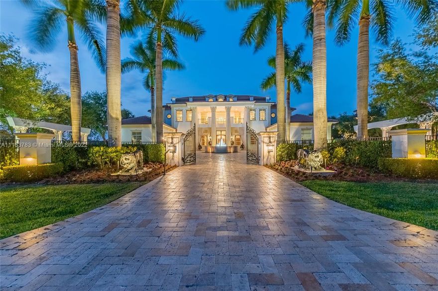 Experience true resort-style grounds at this luxury compound!  Euro-inspired design with impressive columns and grand entrance signal your arrival. Ample space w/master downstairs, home gym & office. 5 beds upstairs with home theatre and upstairs den. Substantial investment undertaken to create a unique lifestyle on-site includuing: heated pool features fiberoptics & salt-water filtration & 10-person in-pool spa. Summer kitchens w/commercial refrigeration, sinks, dishwasher, bar, habachi, smokers, grills. Outdoor cameras,  Lutron, speakers & 5 TV's. Putting green, campfire and NBA regulation basketball court w/college & NBA lines on solid concrete slab.
Roof & gutters 3 years old & new wood floors (2021). Lemon, mango & banana trees. 2 guest houses each w/full kitchen & living rooms.