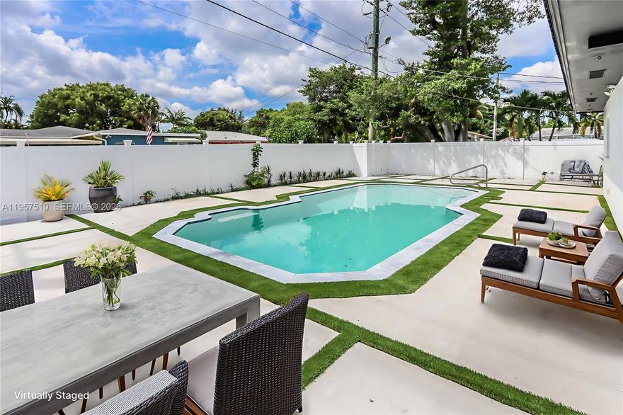 Welcome to this charming 5-bedroom, 3-bath, pool home in the desirable Hollywood Lakes neighborhood. Situated on a large corner lot with full PVC privacy fencing, this home offers a spacious layout and a private backyard oasis perfect for relaxing or entertaining. The primary bathroom features a beautiful clawfoot tub and a separate walk-in shower. Enjoy the comfort of impact windows and doors, newer A/C units, and a large patio area ideal for outdoor living. Conveniently located near beaches, lakes, the Intracoastal, schools, parks, shopping, dining, houses of worship, and major highways, this home combines comfort, style, and unbeatable location.