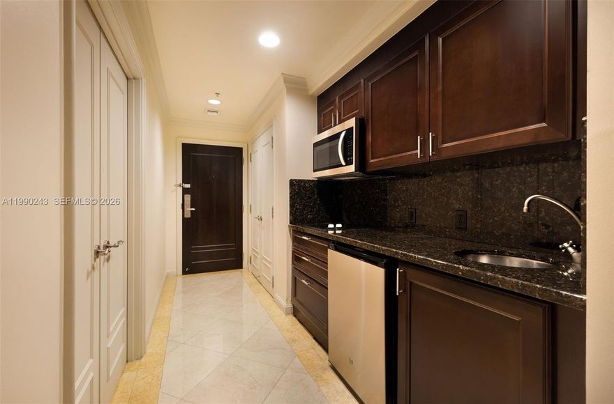 Direct oceanfront residence at The Atlantic Hotel offering a refined blend of luxury, flexibility, and income potential. This fully furnished 1-bedroom showcases sweeping, unobstructed ocean views and an open balcony designed for seamless indoor-outdoor living. Interiors feature elegant finishes, built-ins, and a spacious layout complemented by a spa-inspired bath with dual sinks, soaking tub, and separate shower. Enjoy a true resort lifestyle with full-service hotel amenities including oceanfront dining, pool, fitness center, concierge, and beach service. Daily rentals are permitted with no restrictions, creating exceptional short-term income opportunity or personal use. Ideally positioned on Fort Lauderdale Beach, this condo-hotel delivers a turnkey coastal experience with elevated resort living.