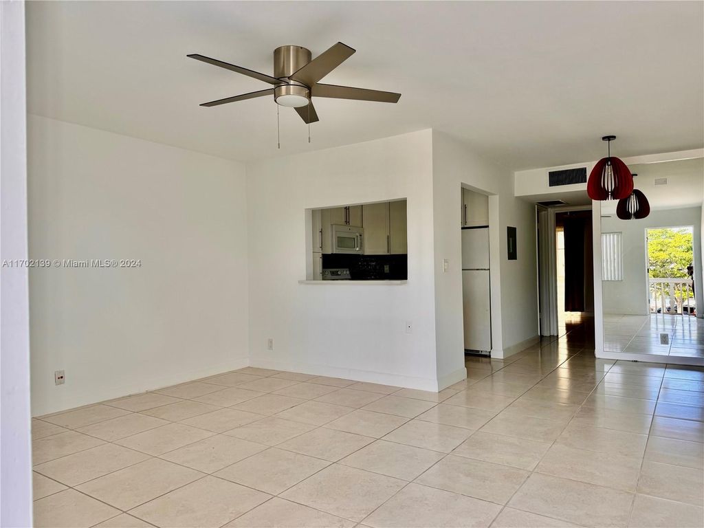 Photo of 555 Purdy Ln #316, Palm Springs, FL 33461 (MLS # A11702139)