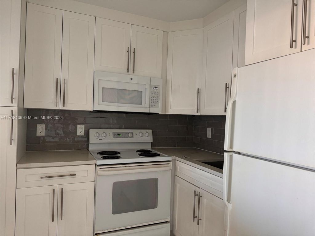 Photo of 555 Purdy Ln #316, Palm Springs, FL 33461 (MLS # A11702139)