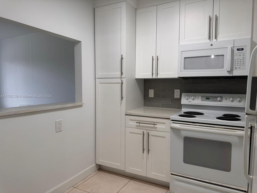 Photo of 555 Purdy Ln #316, Palm Springs, FL 33461 (MLS # A11702139)