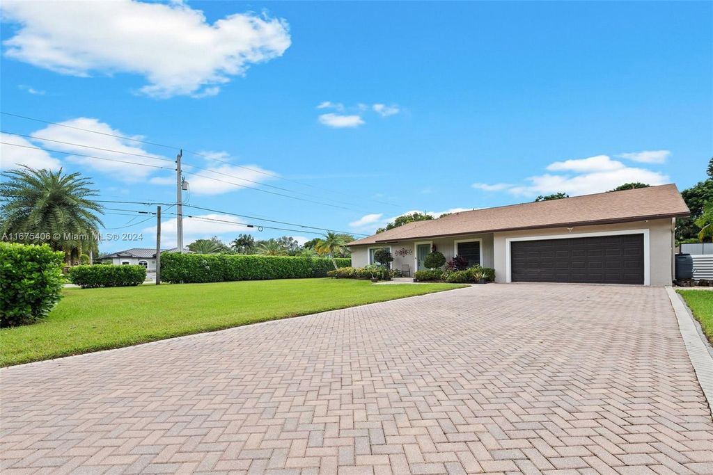 Photo of 18540 SW 61st Ct, Southwest Ranches, FL 33332 (MLS # A11675406)