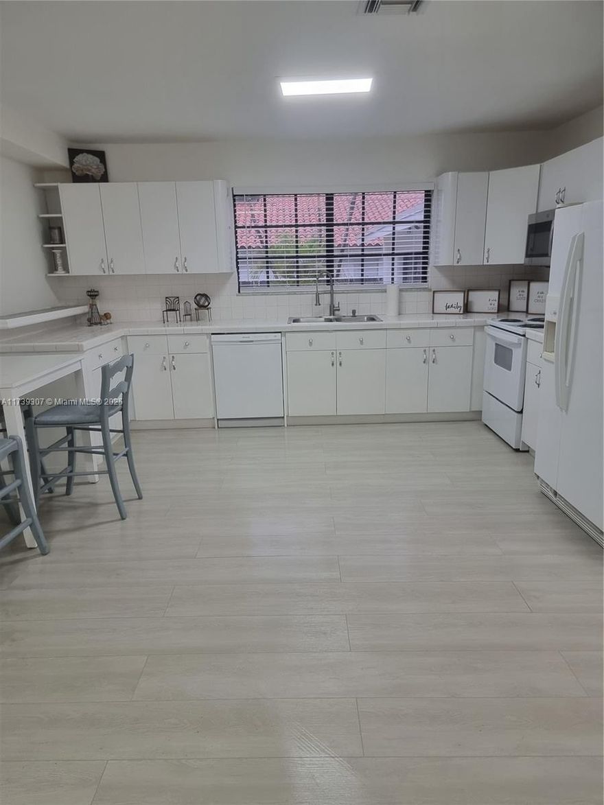 TOTALLY REMODELED INCLUDING PIPING UNDERGROUND. MAIN HOUSE 3 BEDS 2 BATHS. TWO SEPARATE SUITES WITH INDEPENDENT ENTRANCE AND PARKING, POSSIBLE EXTRA INCOME!!!. TWO LOTS. PARK UP TO 8 CARS. LAUNDRY ROOM WITH STORAGE. CENTRAL AC. BIG KITCHEN, WHITE AND FULL OF LIGHT. ROOF 5 YEARS OLD. YARD. ALSO FOR RENT, A11739204, LEASE TO BUY AND SELLER FINANCING.
