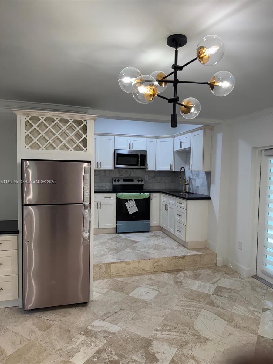 Live close to it all in this garden 2 bed, 2 bath apartment. This gem boasts a calm residential feel, while just moments from the Design District, Wynwood, Midtown, and I-95. A smart, ground-floor choice that pairs convenience, privacy, and price in one of Miami’s most dynamic areas.