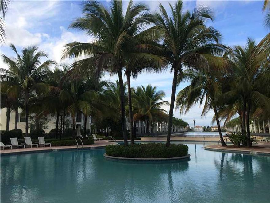 BEAUTIFUL FIORE MODEL TOWNHOME WITH SPECTACULAR VIEW, 3 BEDROOMS AND 2.5 BATHROOMS, WALKING DISTANCE FROM WORLD CLASS SHOPPING, DINING AND ENTERTAINMENT, CLOSE TO EXPRESSWAYS, ARTESIA, THE ULTIMATE RESORT LIFESTYLE AND LUXURY, 3 POOLS, FITNESS CENTER, TEN NIS, SPA, SPORT LOUNGE AND MORE.