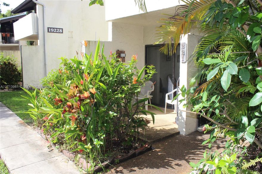 DRASTICALLY REDUCED!!! 
Your corner unit private oasis awaits. With a vaulted ceiling and a balcony off the primary bedroom, this property offers a great opportunity for TLC to create your dream home. Be surrounded by nature, with green lawns in the front and back of your unit and water access allowing you to kayak from your backyard to Oleta River State Park. Walk to the Aventura Mall, the Brightline Station, A-Rated Schools, and Houses of Worship. Access the best of South Florida from your home in a gated community with pool, playground, basketball court, clubhouse, and much more for the whole family and up to 2 dogs. Property passed 50-year certification and has reserves, budget available