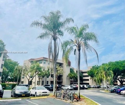 Photo of 1811 Sabal Palm Dr #208, Davie, FL 33324 (MLS # A11904948) Photo of 1811 Sabal Palm Dr #208, Davie, FL 33324 (MLS # A11904948)