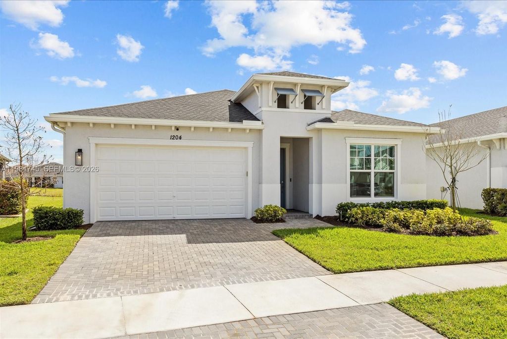 Photo of 1204 SE Woodbine Rd, Port St Lucie, FL 34984 (MLS # A11981745)