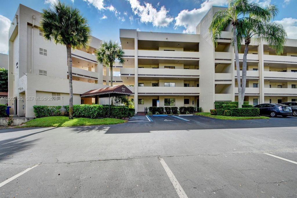 Photo of 3154 Via Poinciana #308, Lake Worth, FL 33467 (MLS # A12002125)