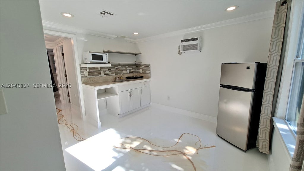 Photo of 1028 S 62nd Ave #B, Hollywood, FL 33023 (MLS # A12046127)