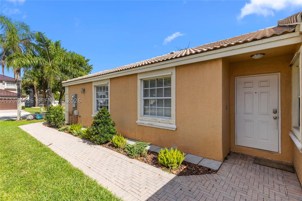 Photo of 363 NW 158th Ave, Pembroke Pines, FL 33028 (MLS # A12065536)